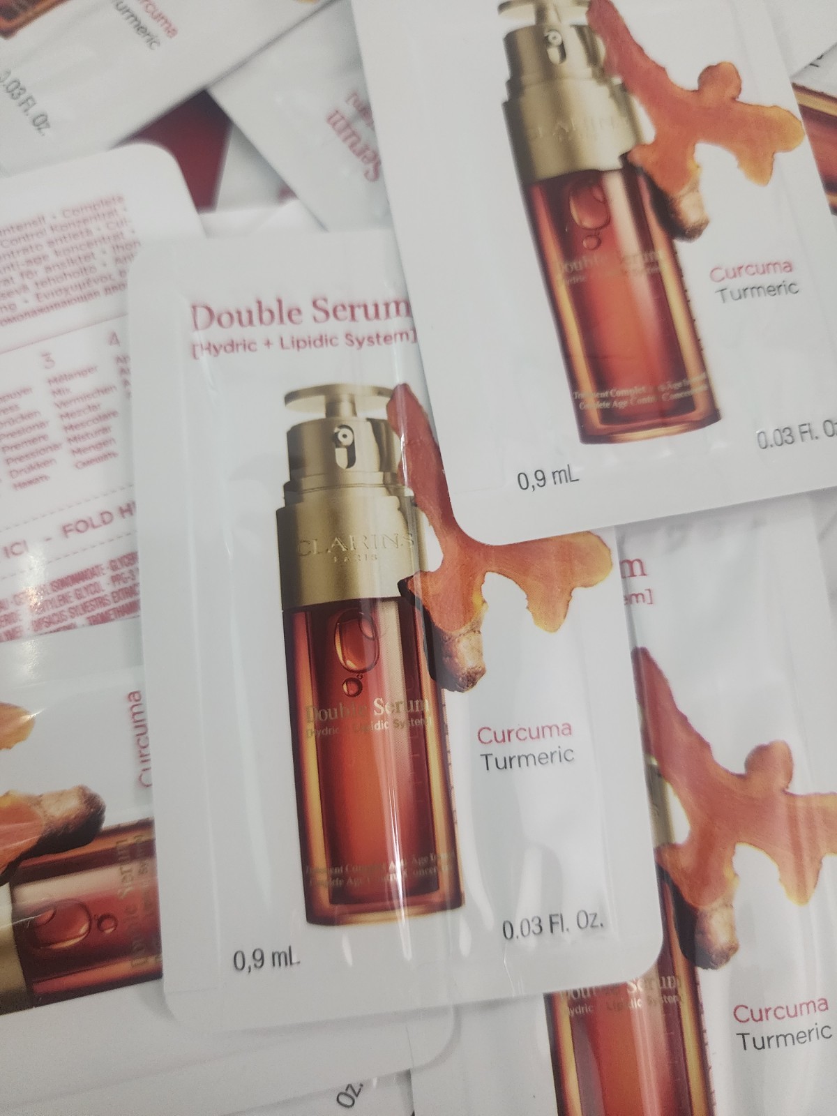 60 CLARINS Double Serum samples 0.9ml / 0.03oz. 60 days supply.