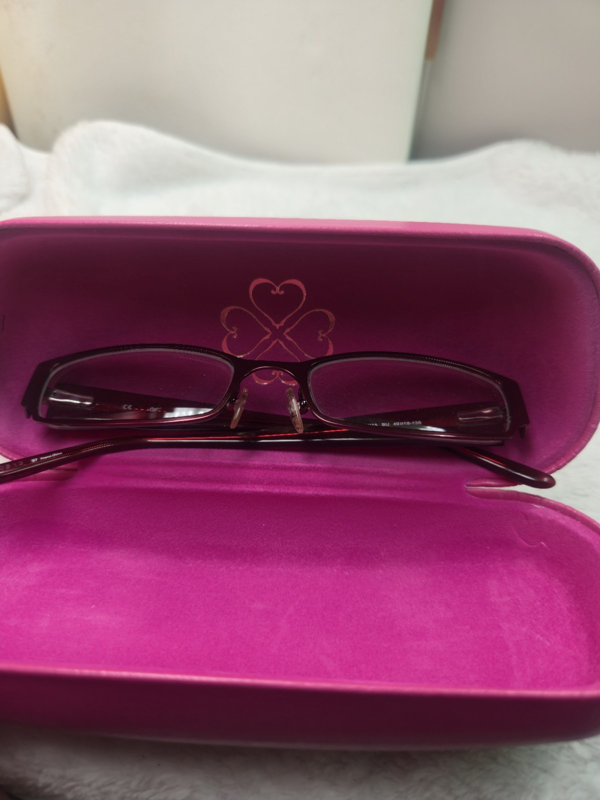 Candie’s branded Elisa burgundy plastic eyeglass frames with a matching hard…
