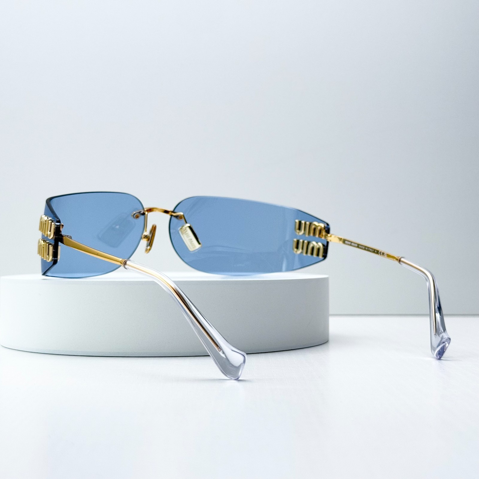 Miu Miu SMUA51 Gold Light Blue Rimless Wrap Sunglasses Women 75mm