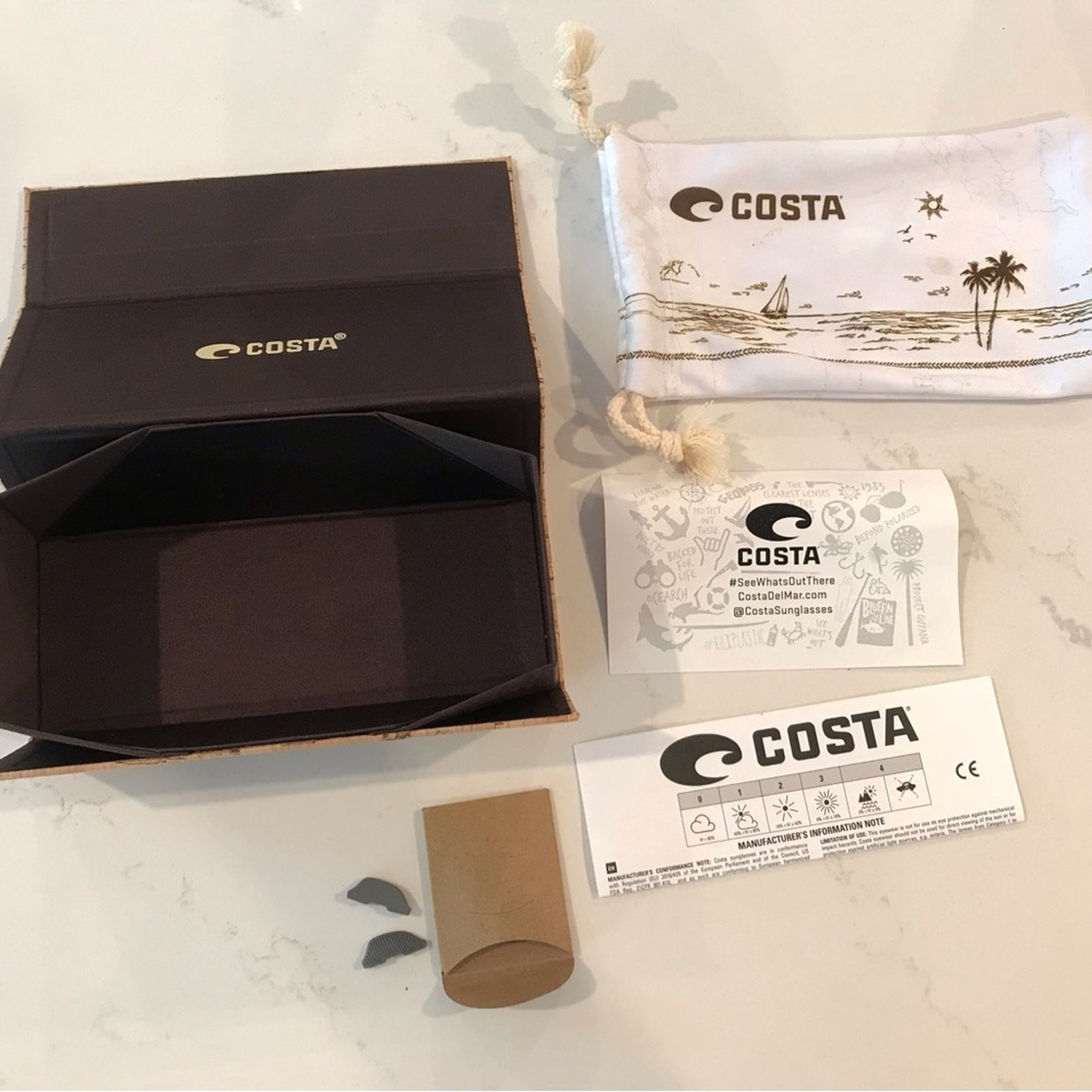 Costa Cork Sunglass Case Includes branded pouch and accessories.