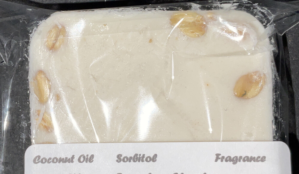 square homemade soaps, an oatmeal bar made for moisturizing and exfoliating