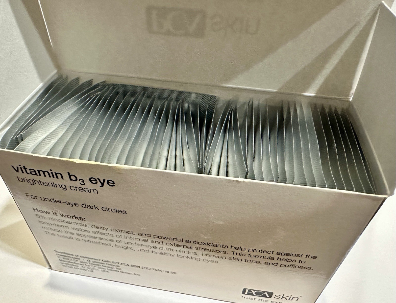 LOT OF 50 PCA SKIN VITAMIN B3 EYE BRIGHTENING CREAM 0.08 OZ (2.5G) PACKETS= 4 OZ