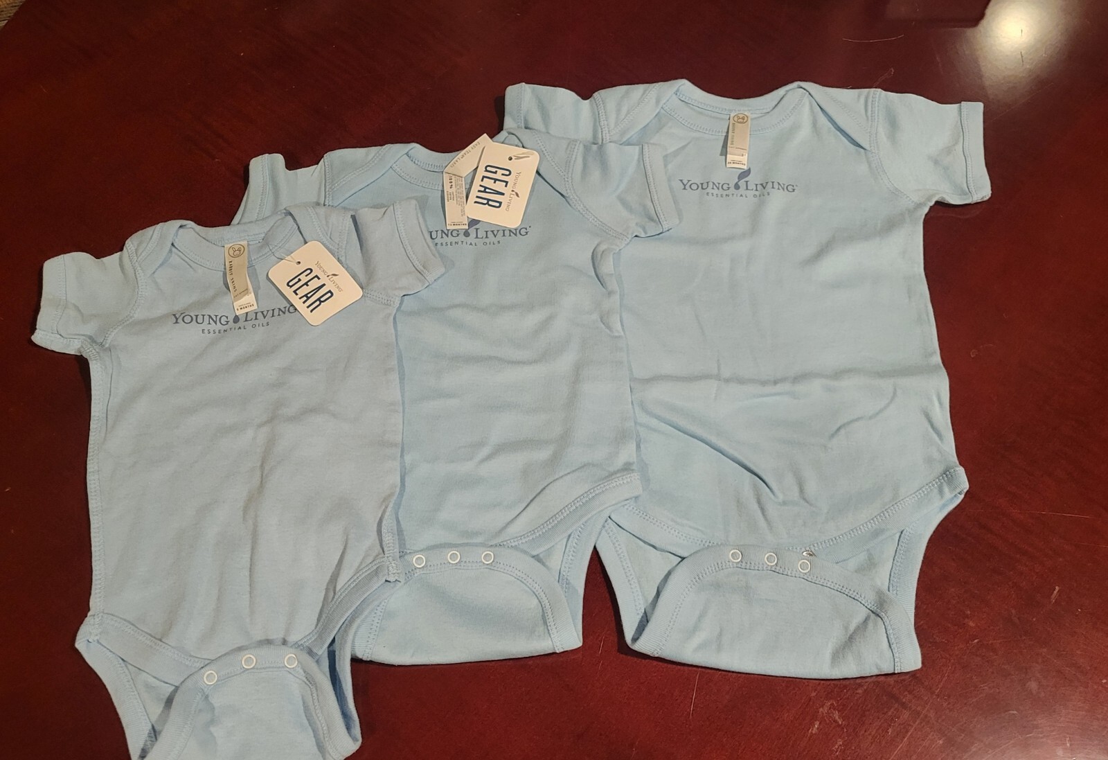 Young Living Baby clothes (6 month, 12 month, & 24 month sizes) – (New)