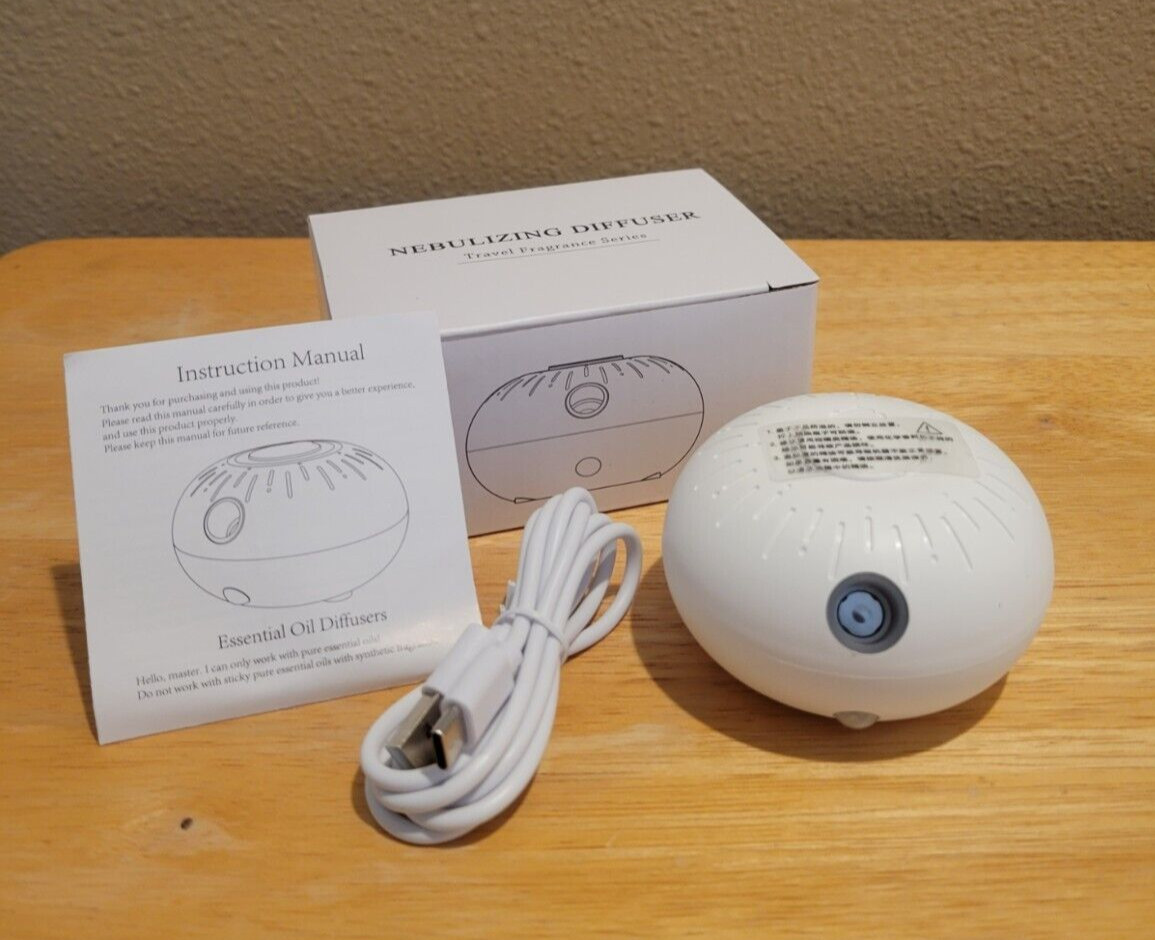 Unbranded Bubble Motion Activated Diffuser Waterless + doTERRA Frankincense 5 ml