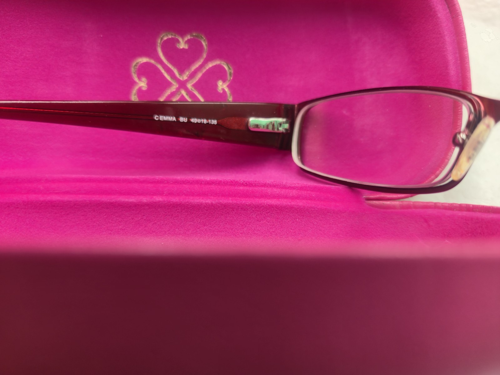 Candie’s branded Elisa burgundy plastic eyeglass frames with a matching hard…