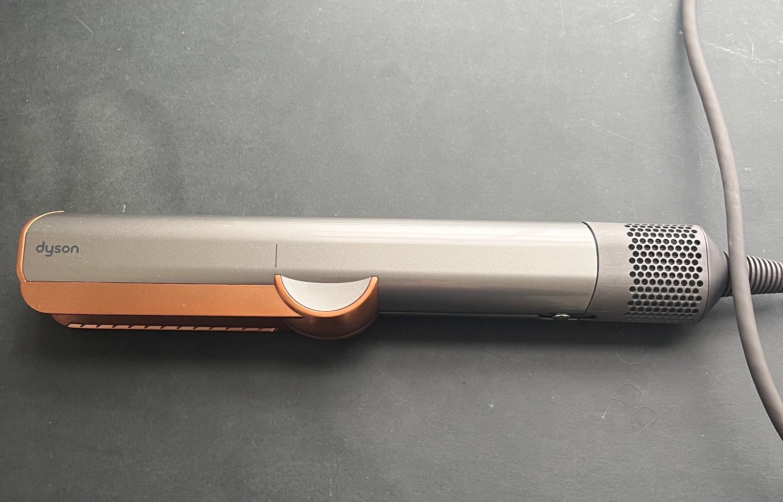 The Dyson Airstrait straightener dries and straightens hair simultaneously.