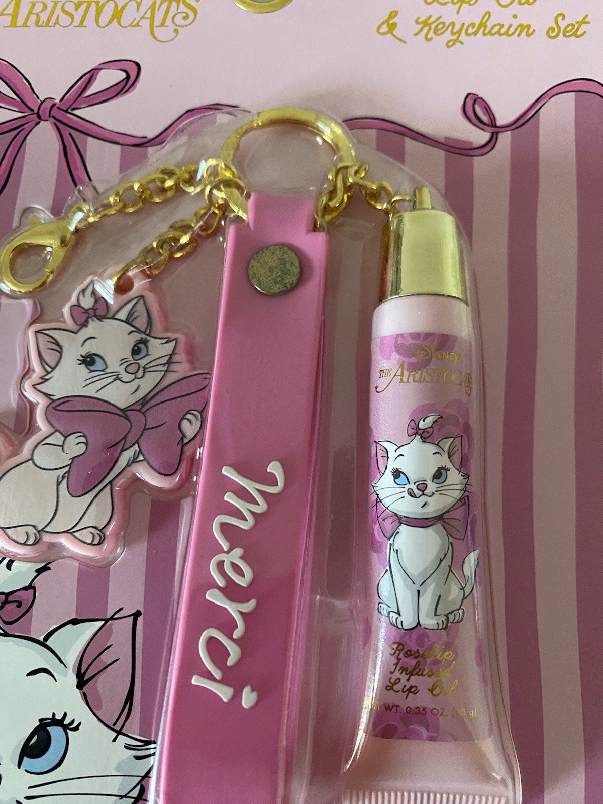 Disney The Aristocats Marie Rosehip Infused Lip Oil Bracelet & Keychain Set NEW
