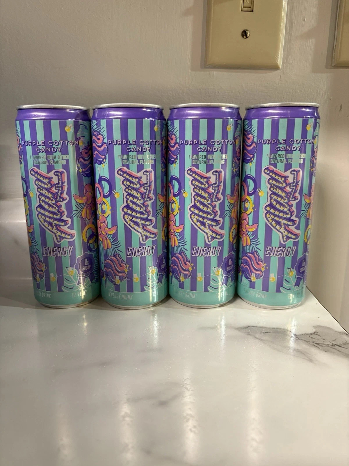 (12 Pack) Alani Nu Energy Drink PURPLE COTTON CANDY, 12Fl oz, PACKED SAFE