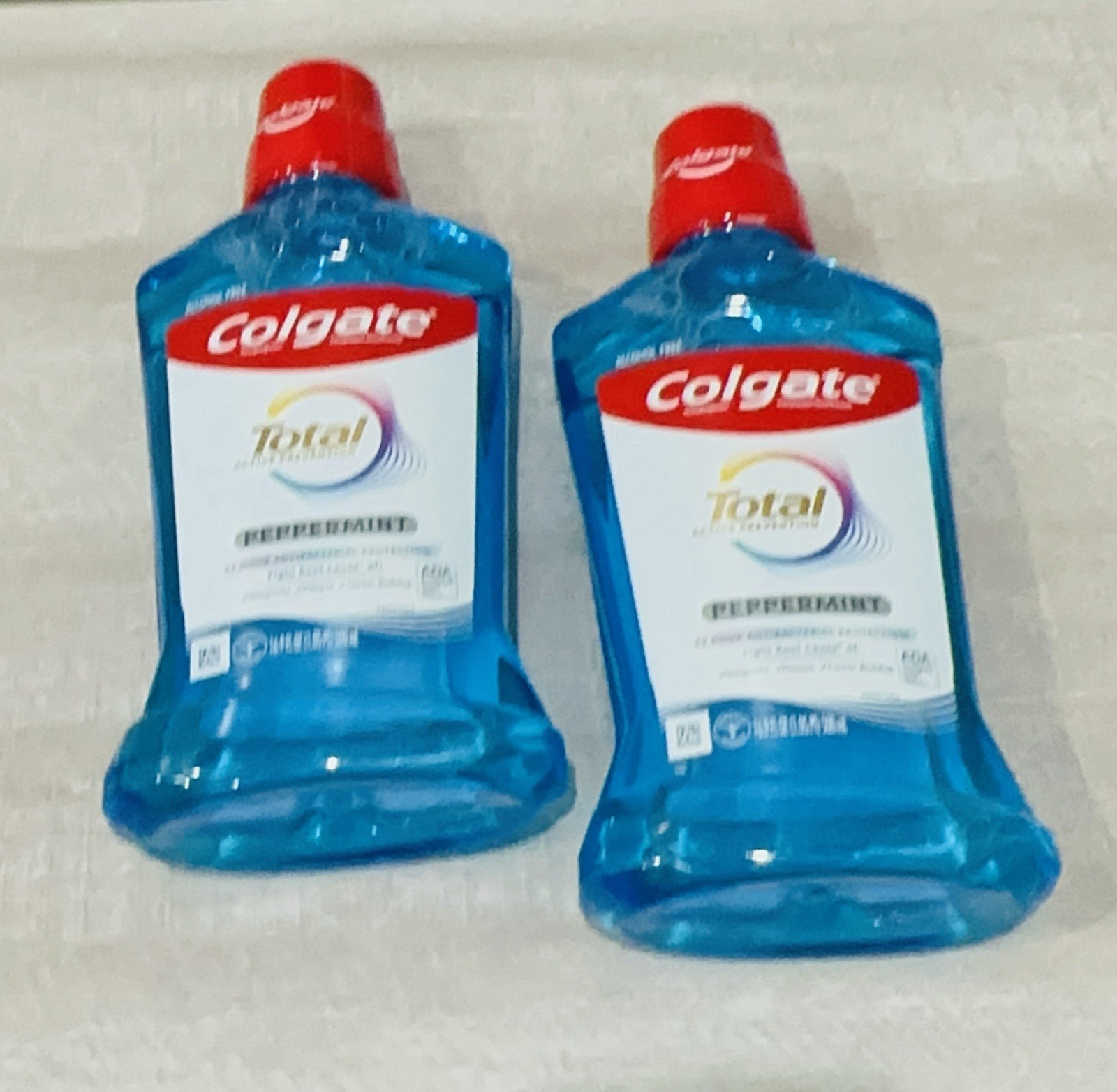 Colgate Total Mouthwash Alcohol-Free, Peppermint, 16.9 Oz, Pack of 4 Mix Pack